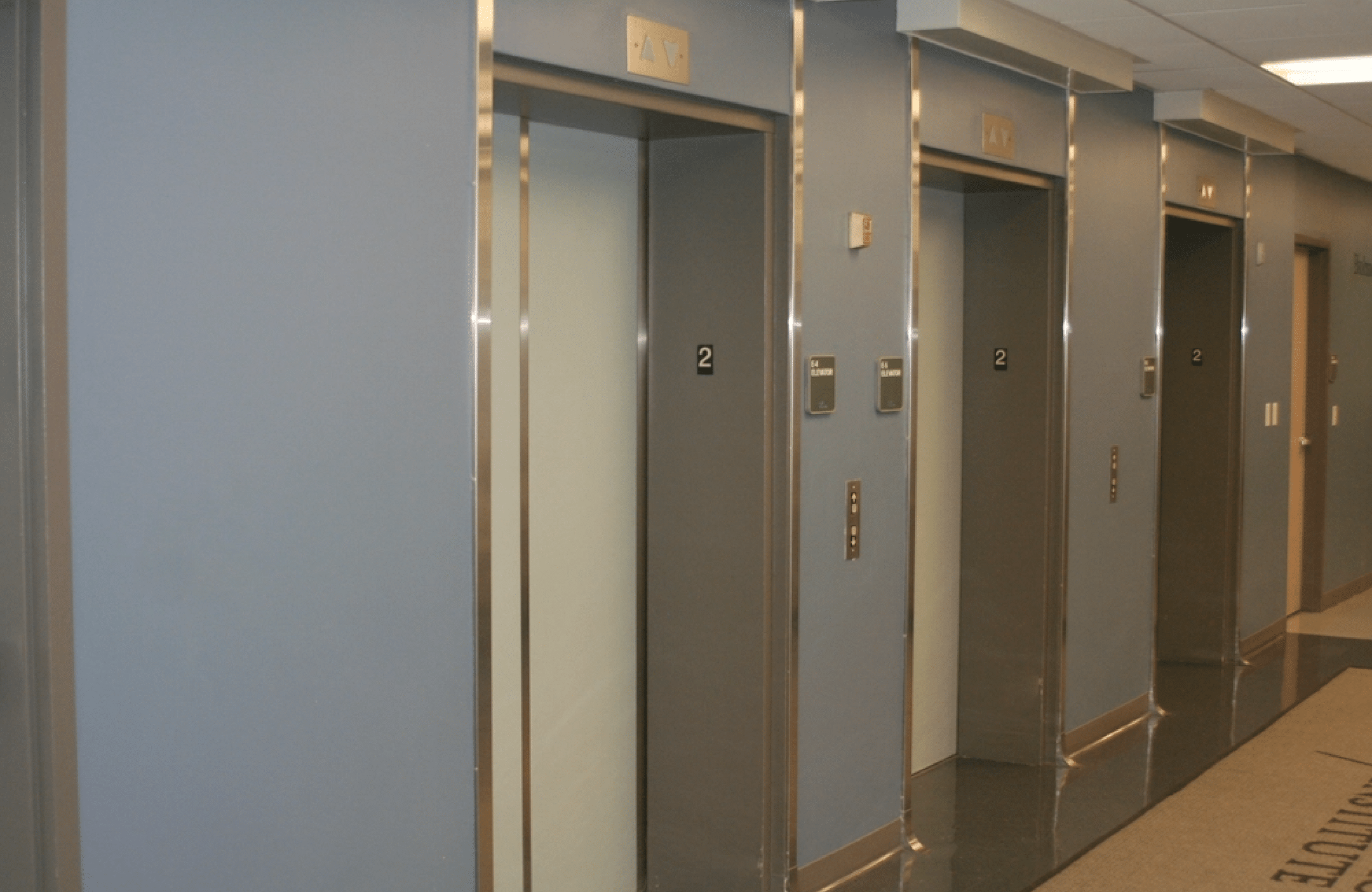 Granite education fire safety system in elevator vestibule